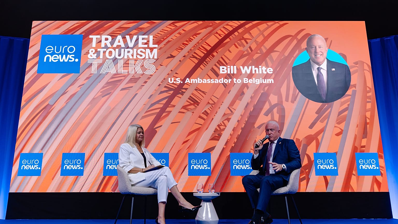 US Ambassador to Belgium, Bill White, sat with Summit host Jane Witherspoon