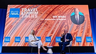 US Ambassador to Belgium, Bill White, sat with Summit host Jane Witherspoon