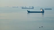 Cargo ships are anchored in the Strait of Hormuz off Bandar Abbas, Iran, on 28 September 2026.