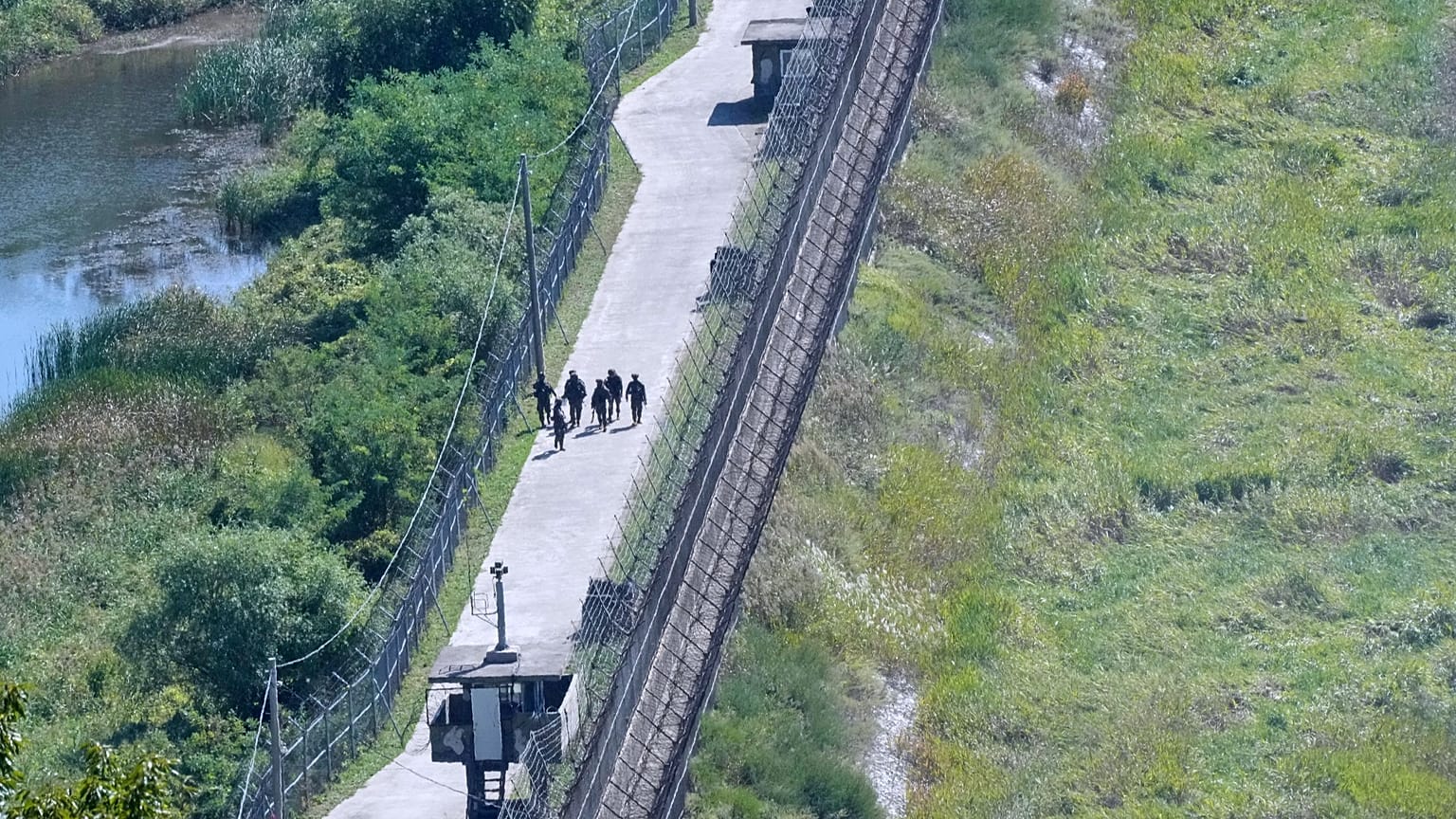 South Korean soldiers patrol along the barbed-wire fence near the border with North Korea in Paju, 29 September, 2026
