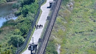 South Korean soldiers patrol along the barbed-wire fence near the border with North Korea in Paju, 29 September, 2026