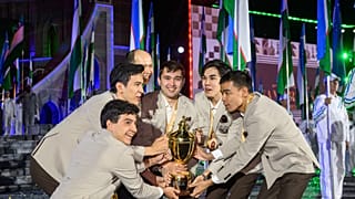 Uzbekistan’s chess team celebrates winning Open gold in Samarkand.