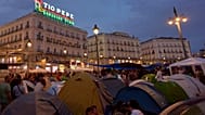 Protesters camp during a protest following the eviction last Wednesday of 87-year-old Maricarmen 