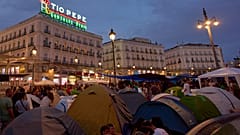 Protesters camp during a protest following the eviction last Wednesday of 87-year-old Maricarmen 