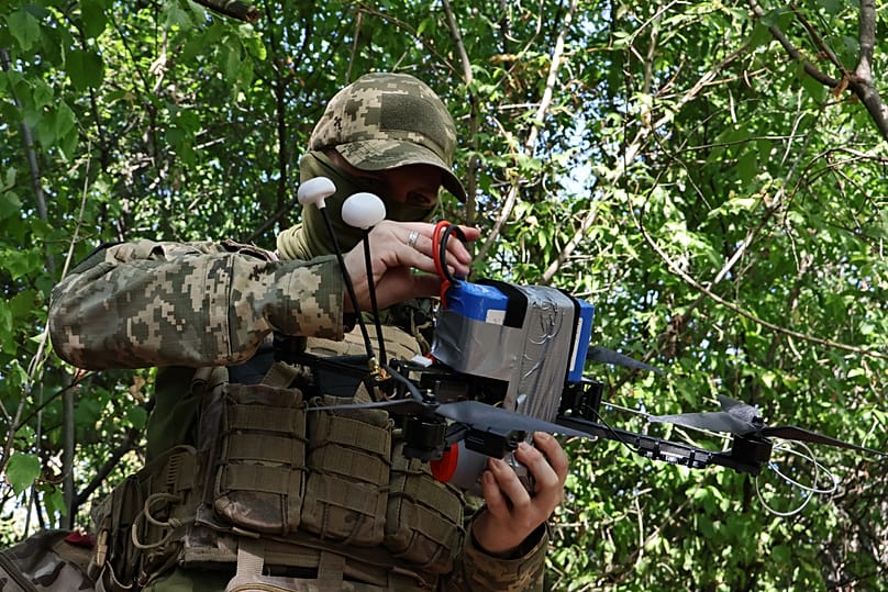 A Ukrainian soldier prepares an FPV drone to fire towards Russian positions in Zaporizhzhia region, 19 September, 2026