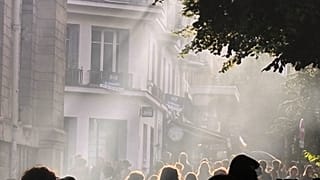 In this photo taken with a smartphone, high school students block the entrance of Voltaire high school to demand more resources, in Paris, Thursday, Oct. 1, 2026