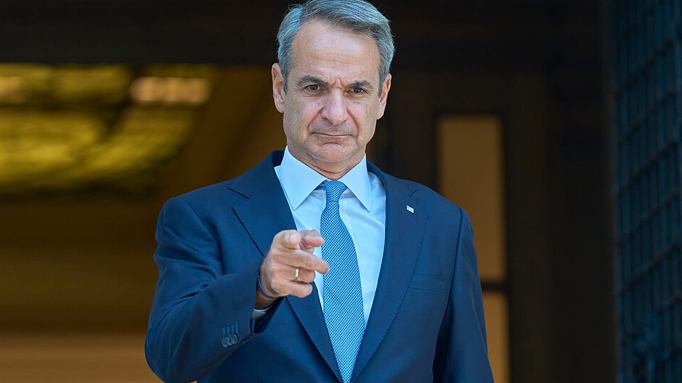 Greece's Prime Minister Kyriakos Mitsotakis, gestures as he waits the arrival of King of Bahrain Hamad bin Isa Al Khalifa before their meeting, in Athens, on Friday, Sept. 18.