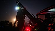 A Ukrainian air defense soldier gets ready to repel Russia's drone attack in Kyiv, Ukraine, Saturday evening, Sept. 19, 2026. 