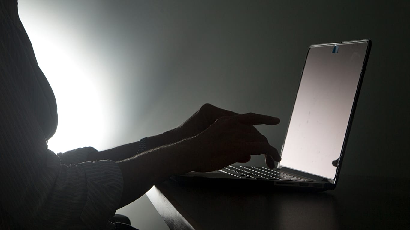 FILE - In this Dec. 12, 2016, file photo illustration, a person types on a laptop in Florida. Riviera Beach, Fla.,