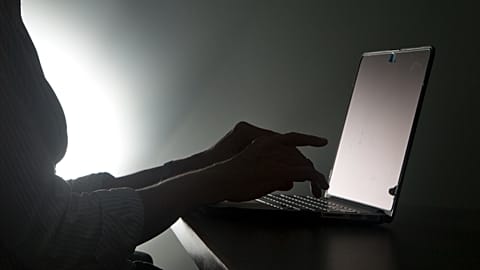 FILE - In this Dec. 12, 2016, file photo illustration, a person types on a laptop in Florida. Riviera Beach, Fla.,