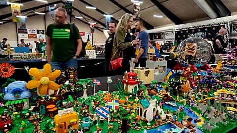 Visitors looking at Lego models at Skaerbaek Fan Weekend in southern Jutland, Denmark