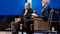 Ai Weiwei talks with Belgian cultural manager Chris Dercon during an event at Bozar (Brussels) - Photo: Isaac Ponseele