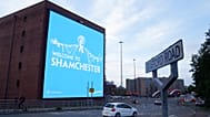 A satirical billboard aimed at Manchester City is seen in Manchester, England, Thursday, Oct. 1, 2026.