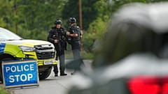 Police guard a road leading to RAF Fairford, 27 September, 2026