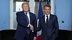 Donald Trump reúne-se com Emmanuel Macron numa reunião bilateral à margem da cimeira do G7, segunda-feira de junho, em Evian-les-Bains, França