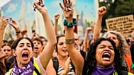 People hold up keys as a sign of protest during a demonstration demanding stronger laws to protect renters in Madrid, Spain, Saturday,