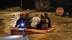 People being rescued during heavy rain in Catalonia, Spain, 3 October 2026.
