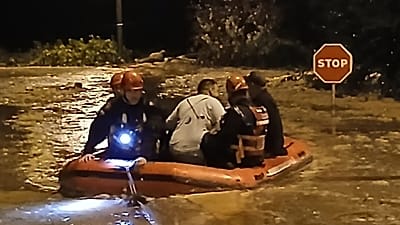 People being rescued during heavy rain in Catalonia, Spain, 3 October 2026.