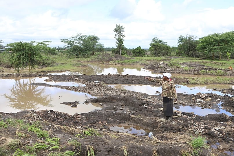62-year old farmer Martha Waema, in her three-acre farm that was submerged by weeks of rainfall in Machakos, Kenya, Wednesday, May 8, 2024. 