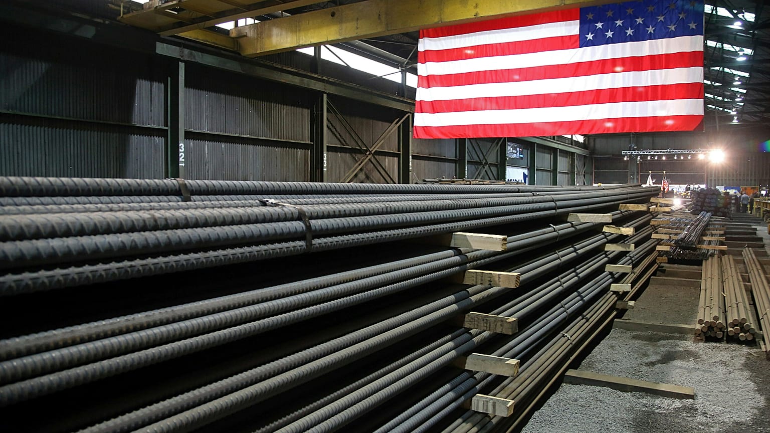 In this 9 May 2019, photo, steel rods produced at the Gerdau Ameristeel mill in St. Paul, Minnesota await shipment.