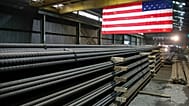 In this 9 May 2019, photo, steel rods produced at the Gerdau Ameristeel mill in St. Paul, Minnesota await shipment.