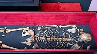 The remains of medieval ruler Czar Samuel are seen inside a coffin during a handover ceremony, in Thessaloniki, northern Greece, Saturday, Oct. 3, 2026.