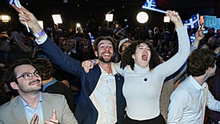 Parti Quebecois supporters cheer as results come in at PQ headquarters on election night in Montreal, Quebec on Monday, Oct. 5, 2026