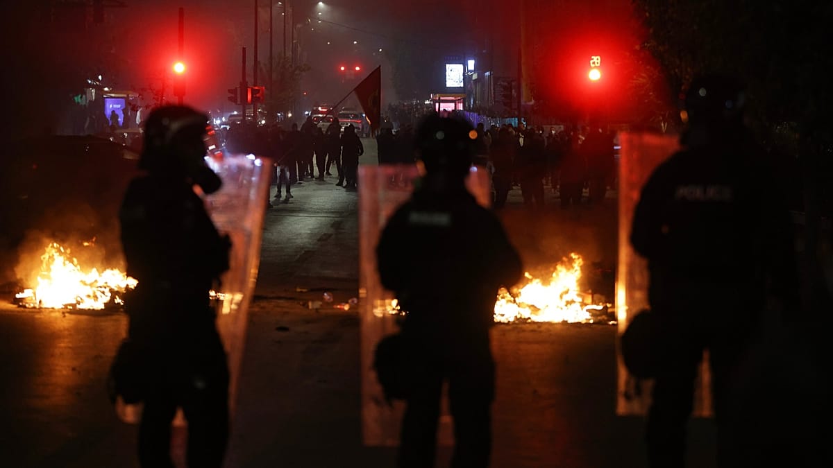 Kosovo police use tear gas on protesters objecting to war crimes court Kosovo police use tear gas on protesters objecting to war crimes court