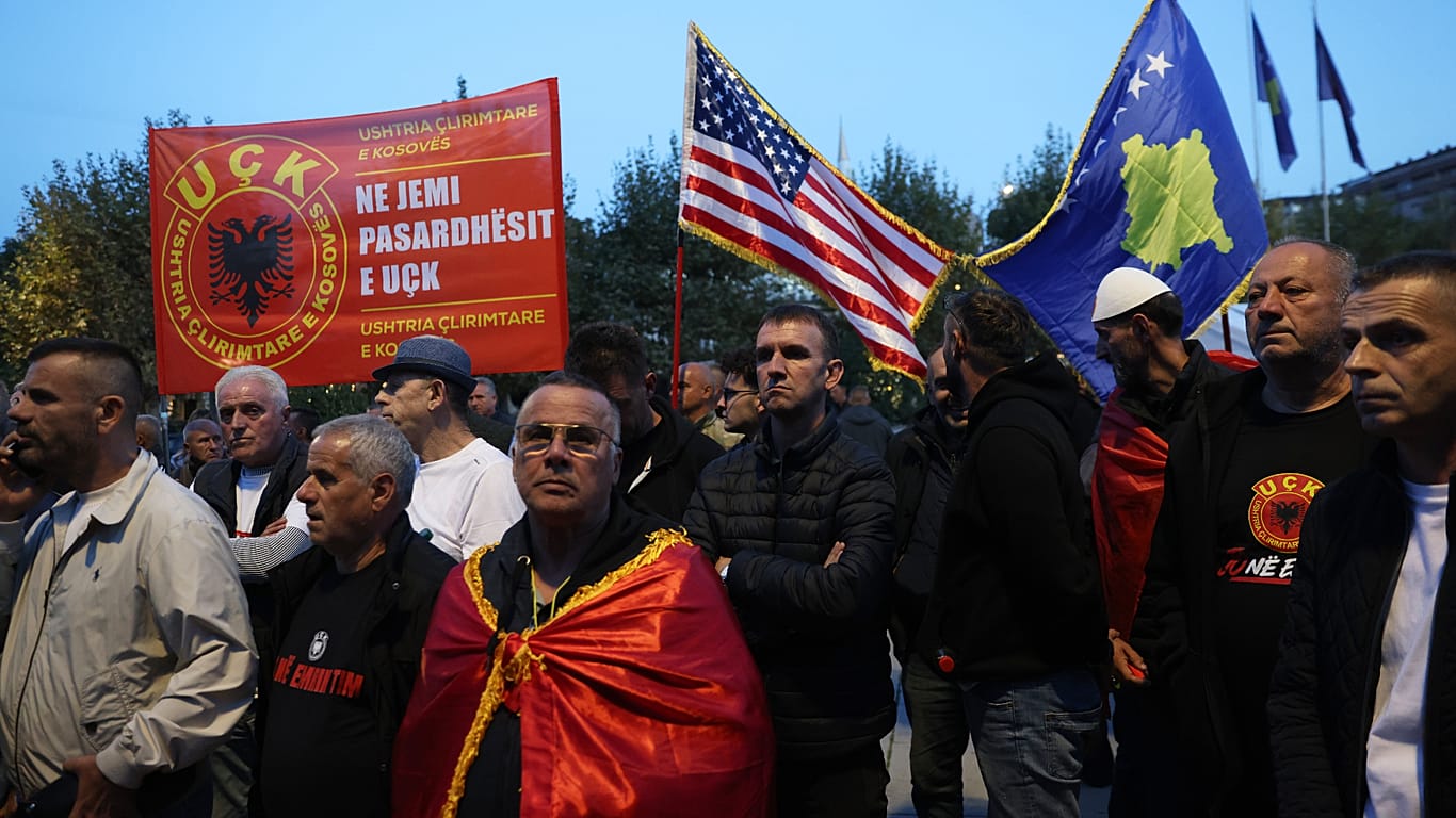 People gather to protest war crimes verdicts in Pristina, Kosovo, Monday, Oct. 5, 2026.