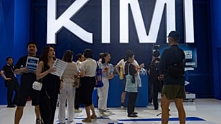 FILE. Attendees visit the booth for Chinese AI startup Moonshot's Kimi K3 during the World AI Conference in Shanghai, 17 July 2026