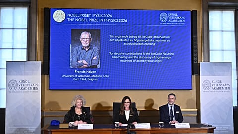 A portrait of Francis Halzen is shown on the screen as the panel announce the recipient of the 2026 Nobel Prize in Physics at the Royal Swedish Academy of Sciences, Stockholm.