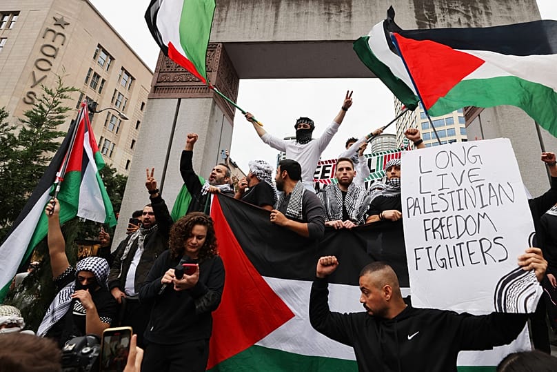 Palestinian supporters rally in Seattle on Saturday, Oct. 14, 2023. (Karen Ducey /The Seattle Times via AP)