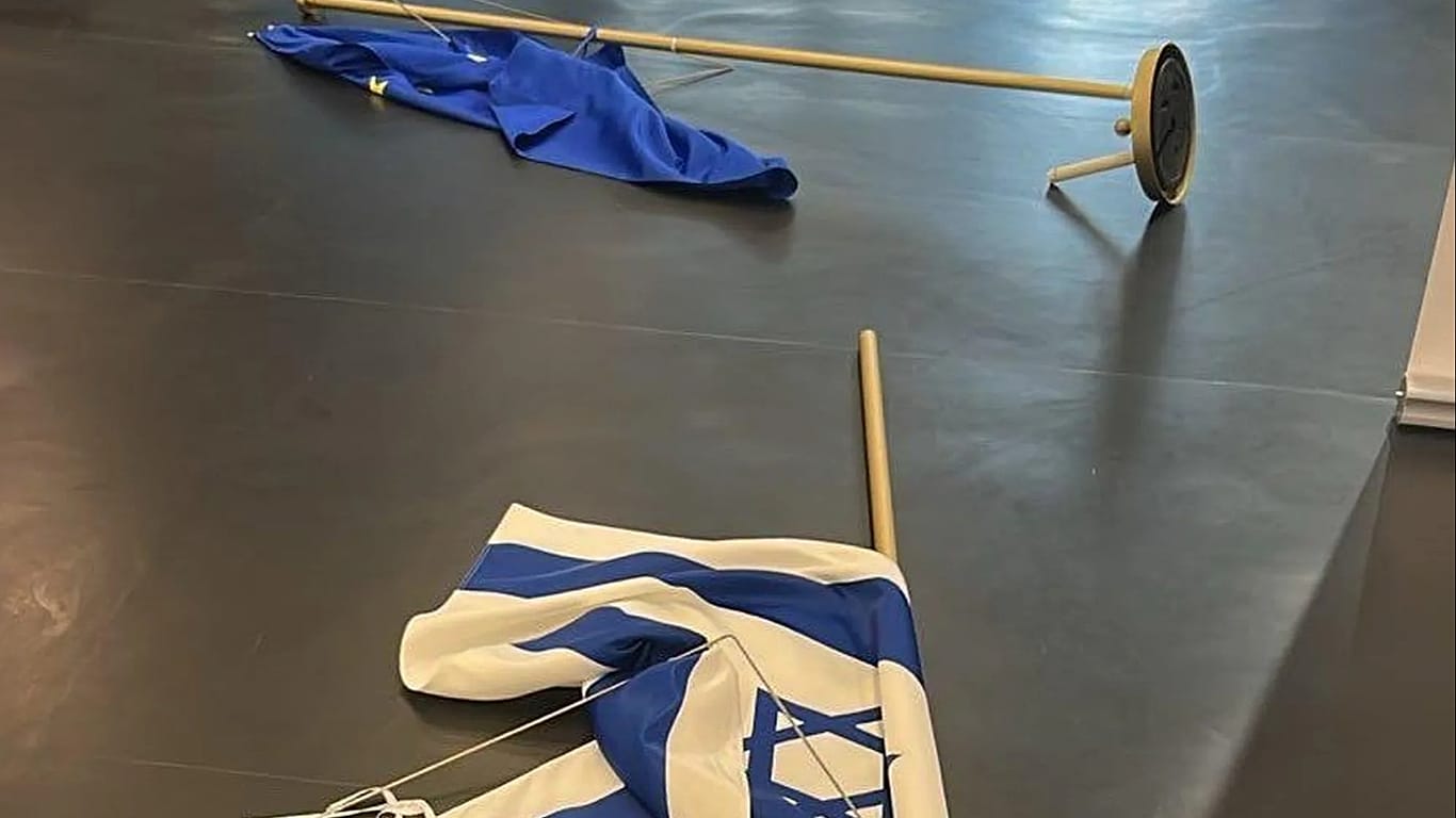 A picture of Israel's and EU's flags on the ground in the European Parliament