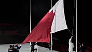رفع العلم القطري خلال الحفل الختامي لدورة الألعاب الآسيوية في ناغويا ، اليابان ، الأحد ، أكتوبر. 4, 2026.