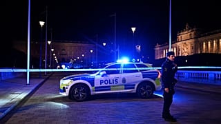 A policeman stands at a police cordon after an incident near the Royal Palace in central Stockholm, Sweden, Tuesday Oct. 6, 2026.