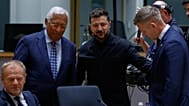Ukraine's President Volodymyr Zelenskyy, second right, greets Hungary's Prime Minister Peter Magyar, right, next to European Council President Antonio Costa during a round tab
