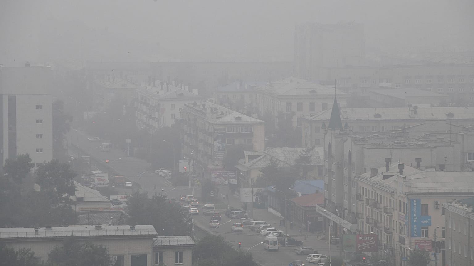 FILE: Heavy smoke covers the center of the eastern Siberian city of Chita, Russia
