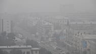 FILE: Heavy smoke covers the center of the eastern Siberian city of Chita, Russia