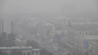 FILE: Heavy smoke covers the center of the eastern Siberian city of Chita, Russia