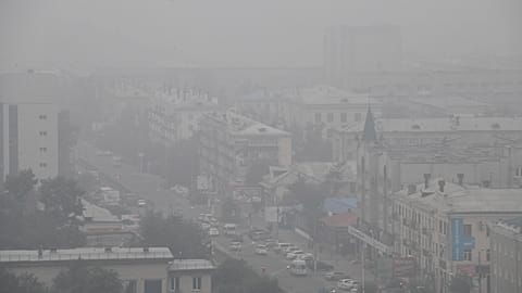 FILE: Heavy smoke covers the center of the eastern Siberian city of Chita, Russia