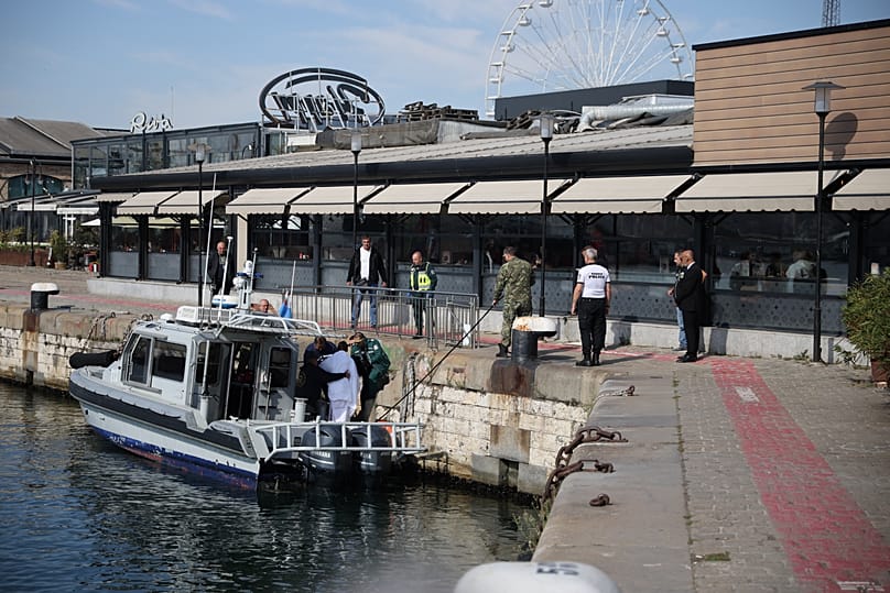 Bulgarian authorities take an injured crew member to a hospital after two commercial vessels were attacked while at sea on 6 October 2026, Varna, Bulgaria.