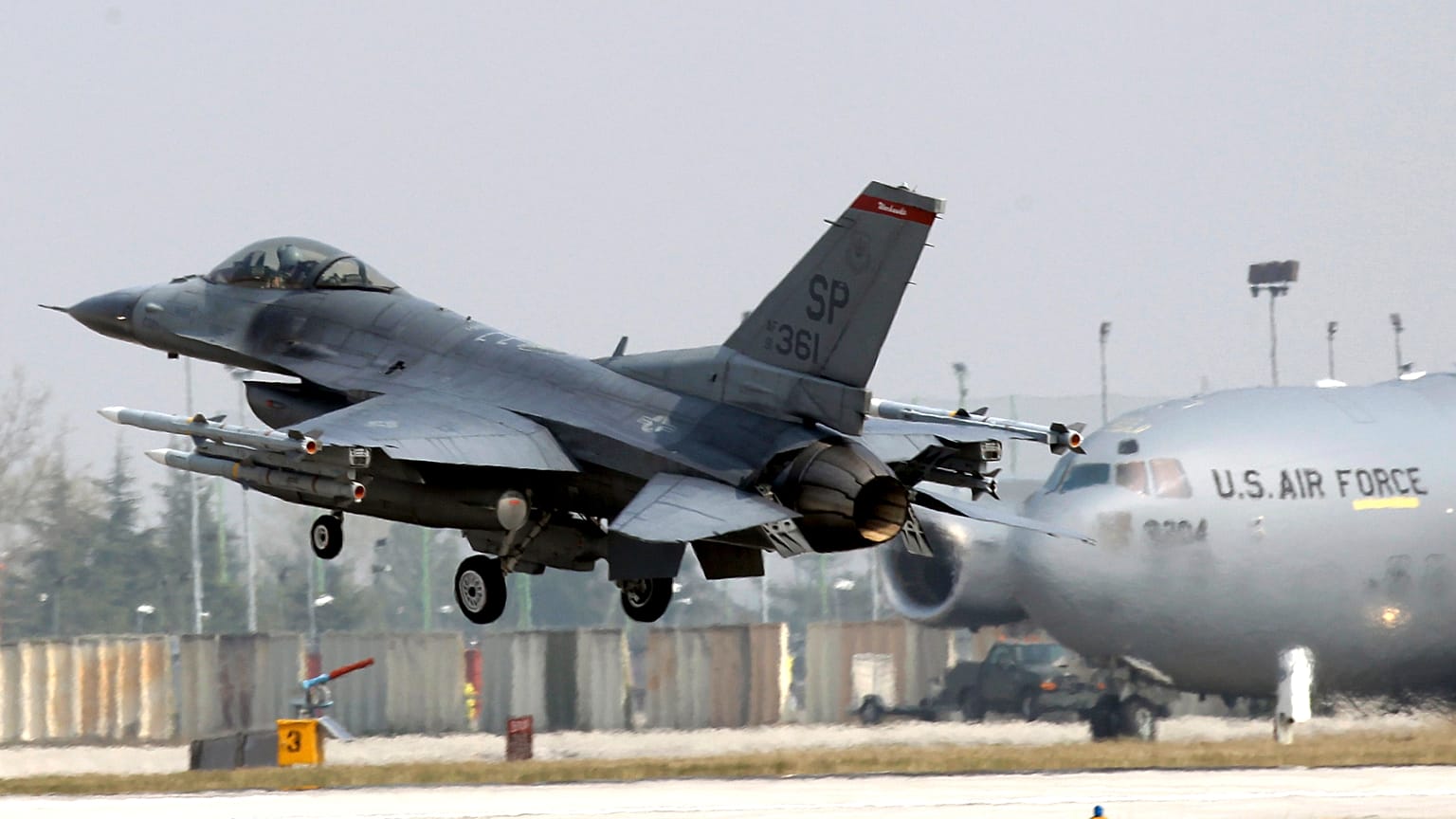 31st Fighter Wing United State Air Force F-16 jet fighter lands at the Aviano NATO airbase, in Aviano, Italy, Friday, March 25, 2011