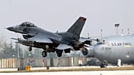 31st Fighter Wing United State Air Force F-16 jet fighter lands at the Aviano NATO airbase, in Aviano, Italy, Friday, March 25, 2011