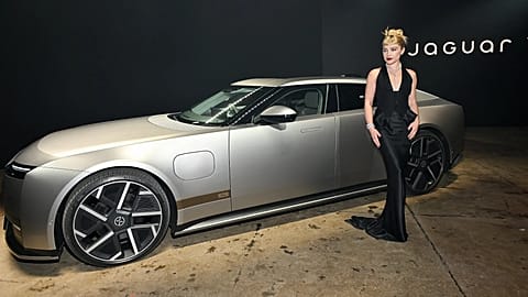 Florence Pugh poses at the Jaguar Type 01 launch event at Storied on Tuesday, Oct. 6, 2026, in New York. (Photo by Evan Agostini/Invision/AP)