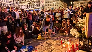 Protesters gather after the reported death of María del Carmen Abascal, the 87-year-old woman whose eviction sparked nationwide protests, in Puerta del Sol square in Madrid, e
