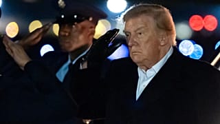 US President Donald Trump salutes as he arrives on Air Force One at Joint Base Andrews, 8 Oct. 2026