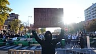 Student in front of the Helene Boucher high School during a protest against under-resourced schools, in Paris, Thursday Oct. 8, 2026. 