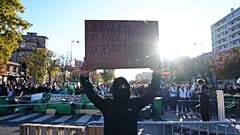 Student in front of the Helene Boucher high School during a protest against under-resourced schools, in Paris, Thursday Oct. 8, 2026. 