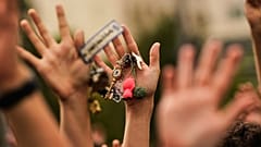 FILE. People hold up keys as a sign of protest during a demonstration demanding stronger laws to protect renters in Madrid, Spain, 3 Oct. 2026