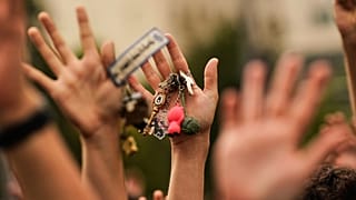 FILE. People hold up keys as a sign of protest during a demonstration demanding stronger laws to protect renters in Madrid, Spain, 3 Oct. 2026